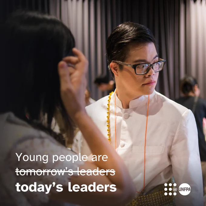 A photo of a young person a white shirt looking at something off-camera. White text overlaid reads “Young people are tomorrow’s leaders.” However, the words “tomorrow’s leaders” are crossed out and replaced by the words “today’s leaders”. The UNFPA logo is in the bottom right corner.