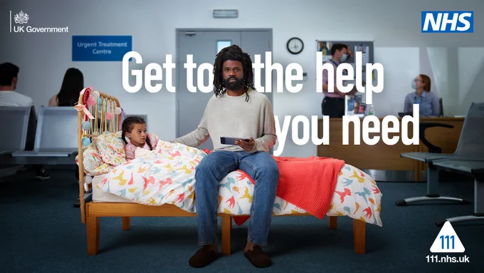 A man sat on a bed with their child who looks unwell. He is holding a mobile phone in his hand. The bed is in the middle of an urgent treatment centre waiting room.

The headline text reads: "Get to the help you need"

The 111 logo features in the bottom right of the image. The NHS logo features in the top right of the image.