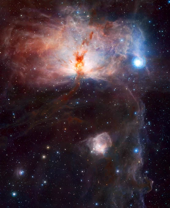 This infrared image shows the Flame Nebula, NGC 2024, in Orion from VISTA. In the middle there’s a tight group of young stars that you can’t normally see because they’re hidden behind thick dust in ordinary light. Lower down there’s a faint hazy spot called NGC 2023. Down in the bottom right you can see the dark outline of the Horsehead Nebula. On the right you see a bright blue star from Orion’s Belt.

Credit: ESO/J. Emerson/VISTA. 