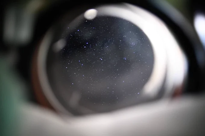A long-exposure photograph capturing the Milky Way galactic plane and faint stars from deep space.
It was taken through one of the optical windows of NASA's Orion spacecraft.