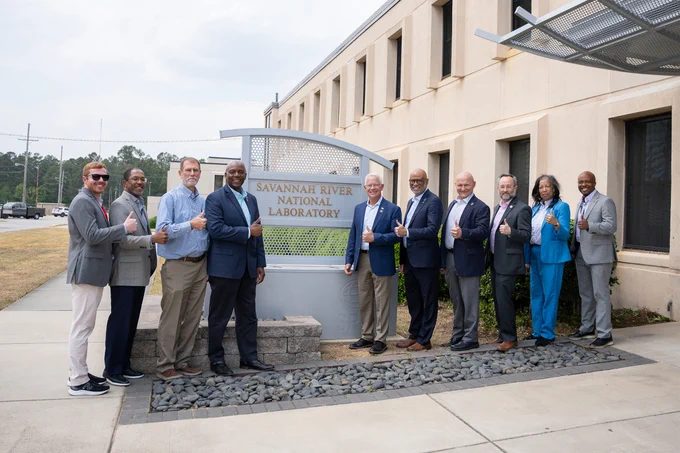 Assistant Secretary for Environmental Management (EM) Tim Walsh, SRNL Laboratory Director Johney Green and other DOE, SRNL, and SRS personnel gathered for a group photo during Walsh’s visit to SRNL. From L-R: Justin Doil, Eric Pierce, Philip “Tony” Polk, Edwin Deshong, III, Tim Walsh, Johney Green, David Brunnert, John Howard, Darlene Prather and Roderick Jackson.