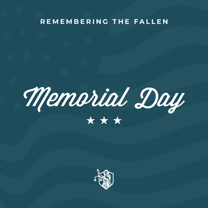 The image features the text "Remembering the Fallen" at the top, with "Memorial Day" and three stars below. The background shows a pattern of the United States flag.