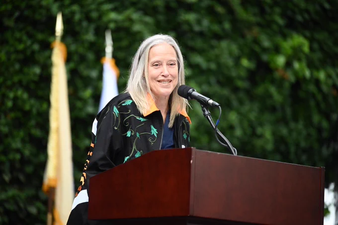 Wendy at the podium