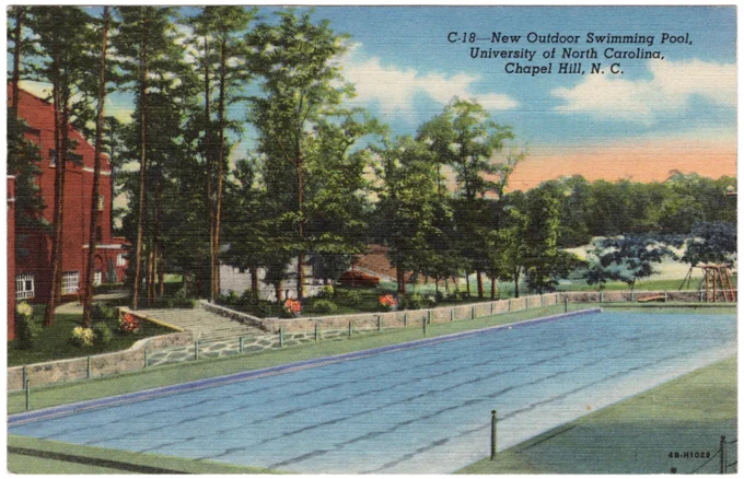 Vintage postcard depicting an outdoor swimming pool at University of North Carolina, Chapel Hill, surrounded by trees and campus buildings under a partly cloudy sky.