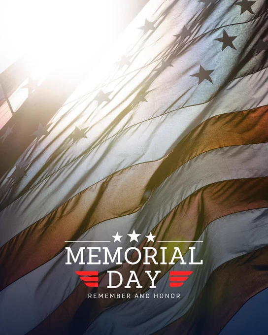 
Memorial Day graphic featuring the backlit, rippling stars and stripes of the American flag with bright sunlight at the top left corner.

