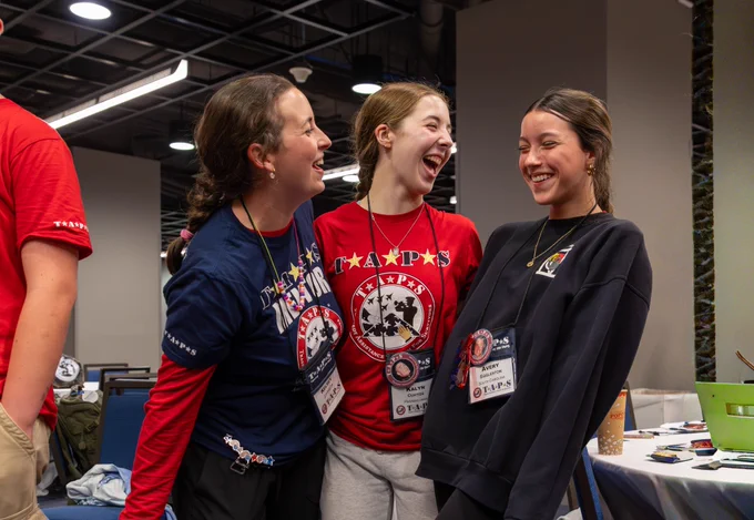 Military children, all wearing TAPS shirts, laugh together. The 32nd annual TAPS grand banquet was held in Arlington, Va., on May 23, 2026. (Courtesy of TAPS)