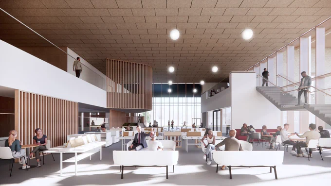 Spacious modern public space with white sofas, wooden accents, and people socialising in a bright, open-plan interior.