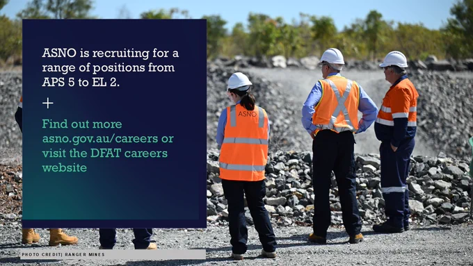 Promotional graphic for ASNO recruitment showing three workers in high-visibility vests and hard hats standing on a rocky mine site. Text reads: “ASNO is recruiting for a range of positions from APS 5 to EL 2. Find out more: asno.gov.au/careers or visit the DFAT careers website.