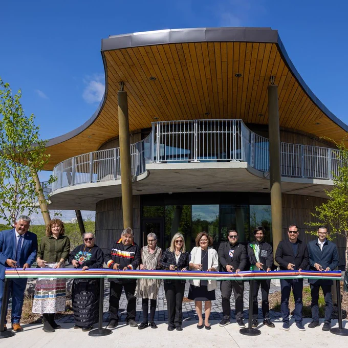 The ribbon cutting took place in front of Indigenous House and included Indigenous community members, the building's architects and U of T executive team members.