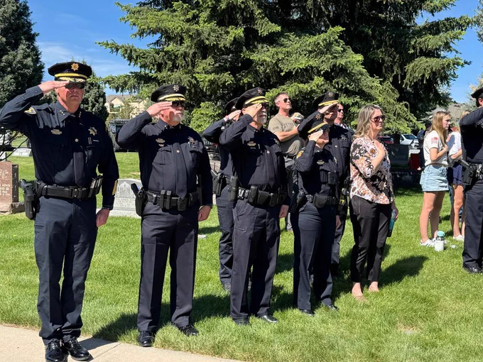 Command Staff saluting