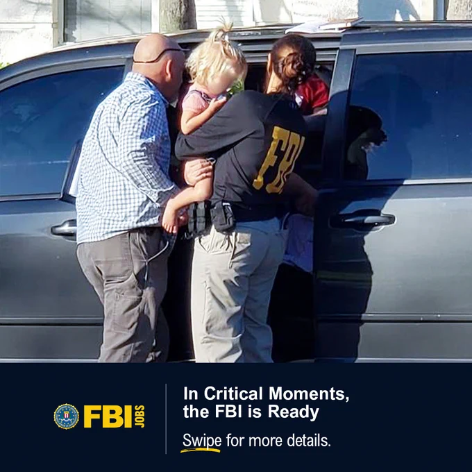 FBI agent holding a young child next to a vehicle. In Critical Moments, the FBI is Ready. Swipe for more details. FBI Jobs logo.