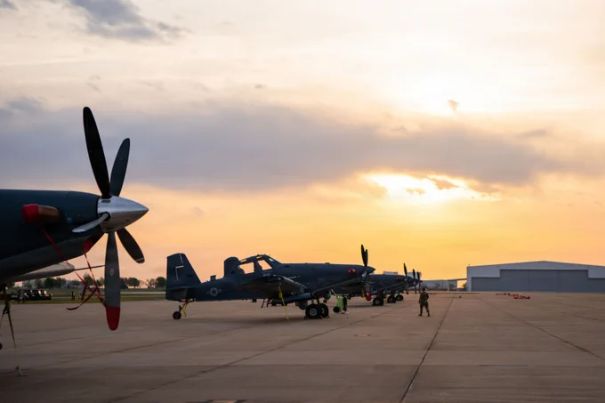 A 137th Special Operations Wing Air Commando, Oklahoma Air National Guard, inspects Air Force Special Operations Command OA-1K Skyraider IIs on the Will Rogers Air National Guard Base flightline, Oklahoma City, March 31, 2026. The OA-1K Skyraider II is a dynamic aircraft with adaptive capabilities tailored for close air support, precision strike, surveillance and reconnaissance mission sets, providing the 137th SOW the leverage to support operations anytime, anywhere. (U.S. Air National Guard photo by Staff Sgt. Erika Chapa)