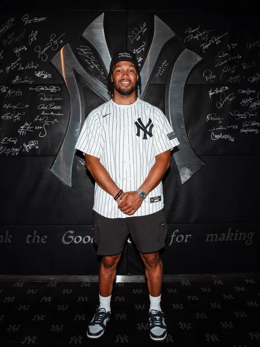 Jalen Brunson at Yankee Stadium in a Yankees Jersey. 