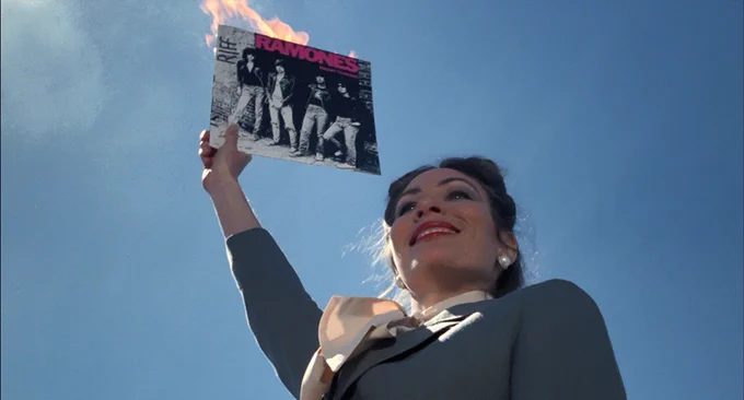 Miss Togar Lights Ramones Album on Fire