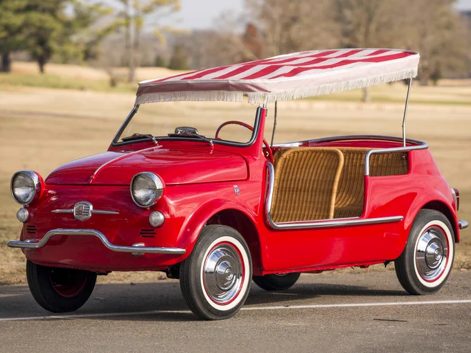 Red Fiat Jolly with wicker seats, and a god damn red striped awning stretched across the top. Literal perfection.