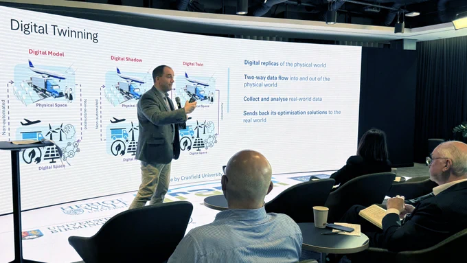 David Flynn, joint programme director of TransiT and Professor of Cyber Physical Systems at the University of Glasgow, presenting at a TransiT event.