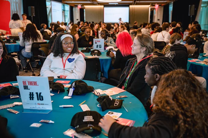 Photos from #GenBeThere: A Night of Connection, Community, and Action at Johns Hopkins University Bloomberg Center featuring young speakers, performers, supportive adults, and community partners gathering in conversation, celebration, and connection.
