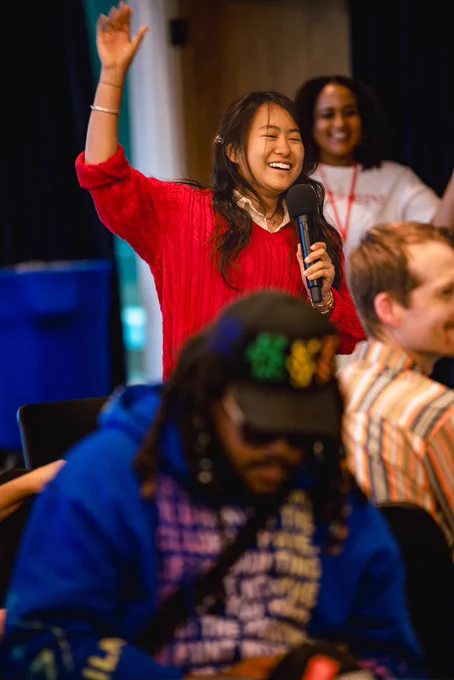 Photos from #GenBeThere: A Night of Connection, Community, and Action at Johns Hopkins University Bloomberg Center featuring young speakers, performers, supportive adults, and community partners gathering in conversation, celebration, and connection.