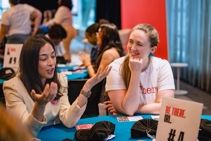 Photos from #GenBeThere: A Night of Connection, Community, and Action at Johns Hopkins University Bloomberg Center featuring young speakers, performers, supportive adults, and community partners gathering in conversation, celebration, and connection.