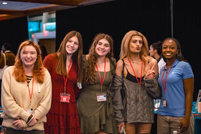 Photos from #GenBeThere: A Night of Connection, Community, and Action at Johns Hopkins University Bloomberg Center featuring young speakers, performers, supportive adults, and community partners gathering in conversation, celebration, and connection.