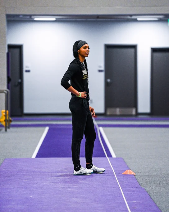 Bria Byrd on the long jump runway inside the Convocation Center.