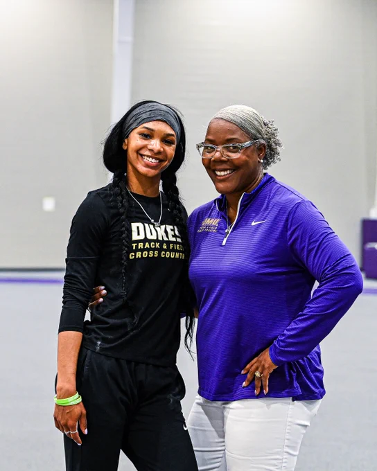 Bria Byrd posing for a photo with Director Delethea Quarles.
