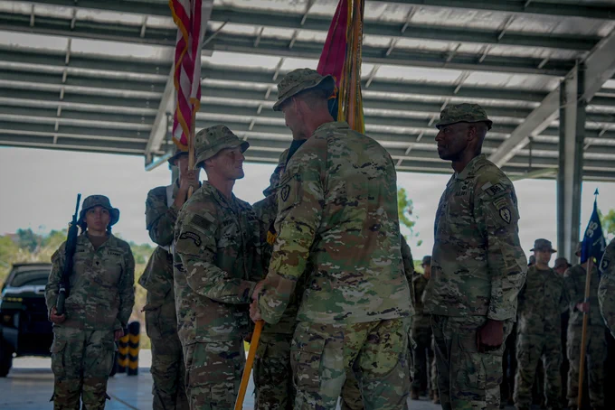 U.S. Army Maj. Gen. James Bartholomees, center, the commanding general for 25th Infantry Division and U.S. Army Hawaii, passes the 3rd Mobile brigade colors to Col. David Brunais, the incoming commander, during Salaknib 2026 at Fort Magsaysay, Nueva Ecija, Philippines, May 25, 2026.
