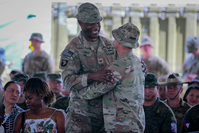 U.S. Army Col. Adisa King, left, outgoing commander for 3rd Mobile Brigade, 25th Infantry Division,, congratulates the incoming commander, Col. David Brunais, at a change of command ceremony during Salaknib 2026 at Fort Magsaysay, Nueva Ecija, Philippines, May 25, 2026.