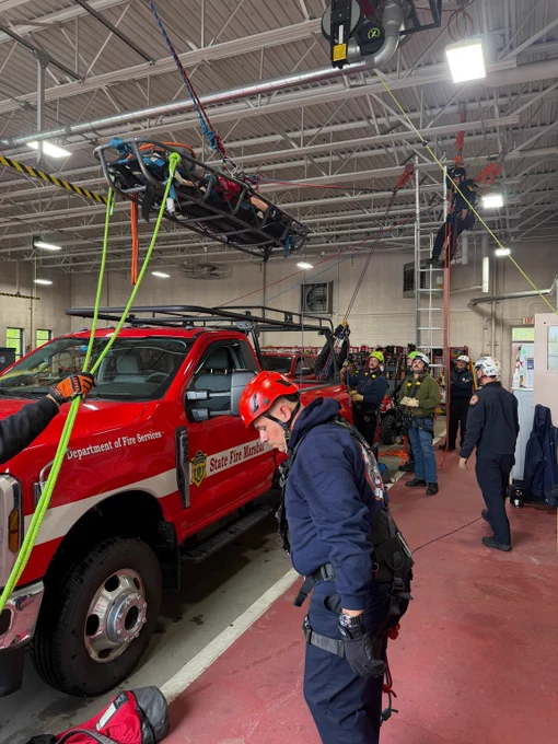 Firefighters training for rope rescue