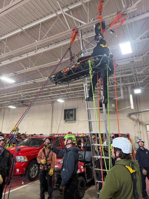 Firefighters training for rope rescue