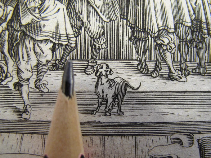 Detail of an engraving showing a dog with a pencil for scale