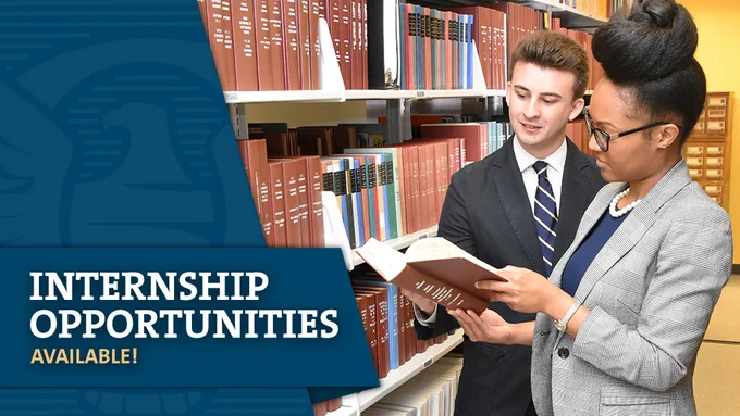 On left side, blue banner showing the eagle in the Copyright Office seal, text: Internship Opportunities Available!; on right side, a white man and black woman in business attire both look at a legal book while standing in library stacks