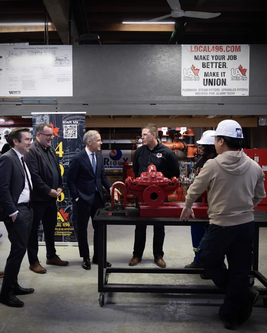 Prime Minister Carney meets with workers in Calgary, Alberta.