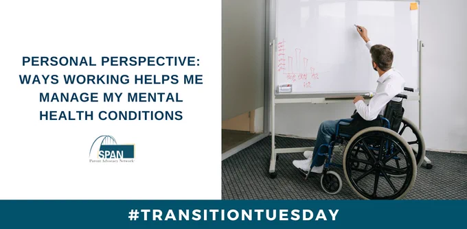 A person in a wheelchair writes on a whiteboard.