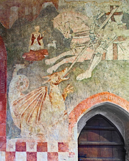 Wall painting of St. George fighting the dragon on horseback, while princess Una prays in the background (c) Andy Marshall