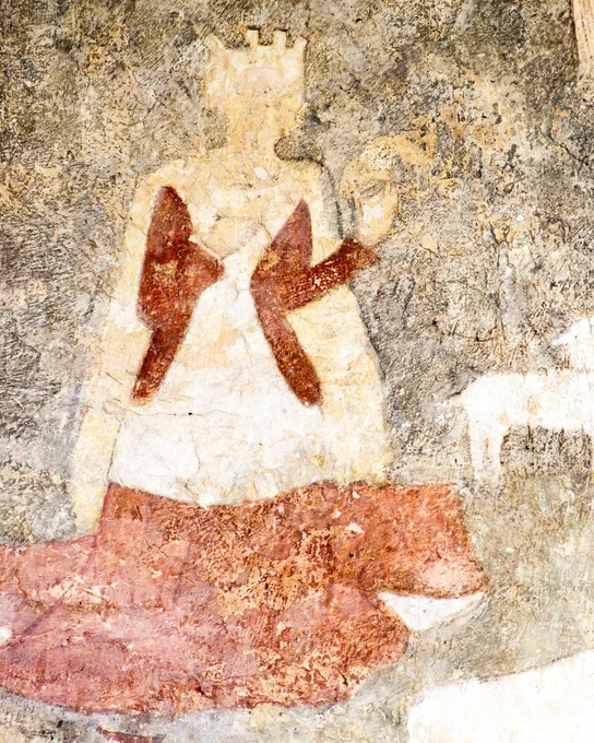 Close up of princess Una kneeling in prayer in a red dress (c) Andy Marshall