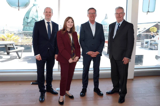 Minister Gordon Lyons, Economy Minister, Caoimhe Archibald and Health Minister, Mike Nesbitt with Commission Chair, Alan Milburn (second from right).