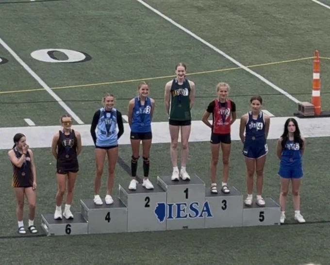 zoey the record breaker on podium