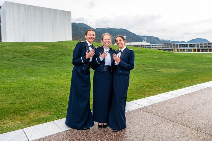 U.S. Air Force Academy female cadets receive their class rings during Ring Dance.