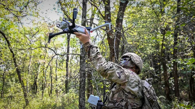 A U.S. Soldier with the Oklahoma Army National Guard launches a drone during Exercise Thunderstruck 2.0 at Camp Gruber Training Center, Okla., Sept. 13, 2025. The training aimed to build Guard members\u2019 ability to operate in a battlespace increasingly shaped by unmanned systems. (U.S. Air National Guard photo by Master Sgt. Amber Monio)