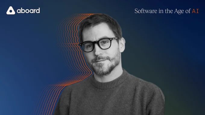 Black and white photo of Craig silhouetted by orange, against a dark blue background. Aboard logo at top in white; "Software in the age of AI" in white and orange in opposite corner.
