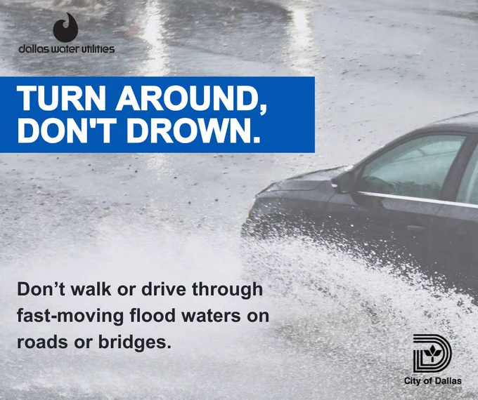 Image of a car driving in a rainstorm 