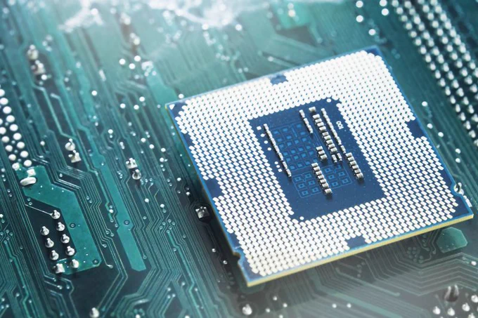 Close‑up of CPU installed on motherboard socket, highlighting processor compatibility, chipset support, and key factors when choosing the right CPU.