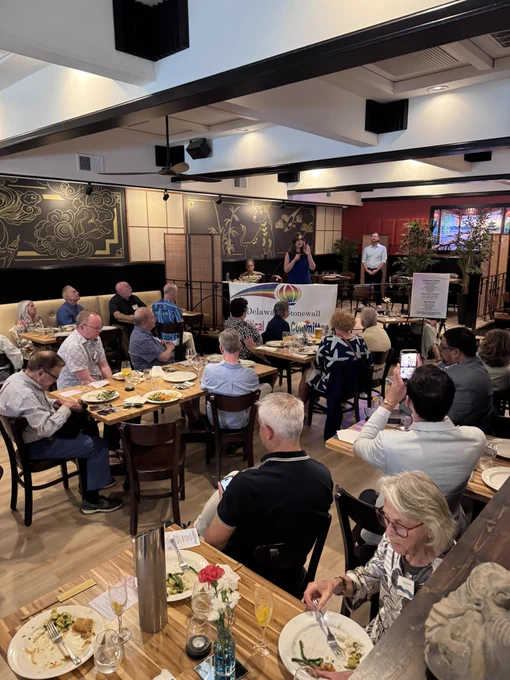 Sarah speaks to attendees at Stonewall PAC’s Summer Fundraiser.