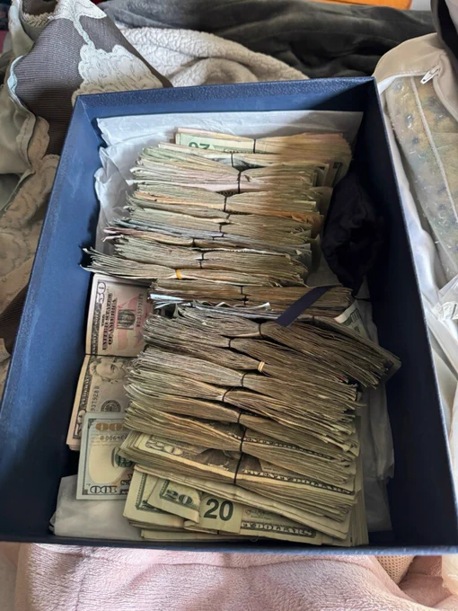 Unidentified amount of cash seized during multiple search warrants with the FBI's Milwaukee Area Safe Streets Task Force and Milwaukee County Sheriff's Office.