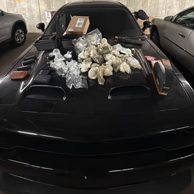 Unidentified quantities of drugs and other items seized during multiple search warrants with the FBI's Milwaukee Area Safe Streets Task Force and Milwaukee County Sheriff's Office.