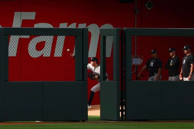 Cam Schlittler warms up in the bullpen before the game. 