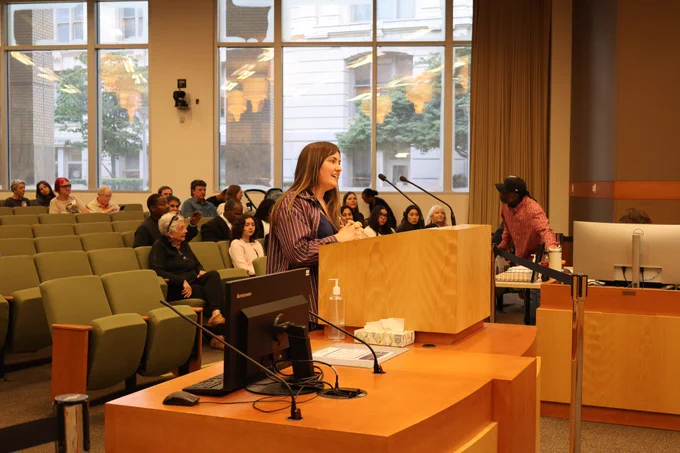 Planning Academy leader speaks at the podium
