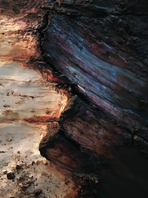 Encaustic wax ground, tectonic layer compression, hot pigment bleed between strata, charcoal impasto dragging, ash and pitch palette, monolith surface under extreme lateral force, slow rupture not explosion, chiaroscuro pressure gradient --ar 3:4 --hd --v 8.1