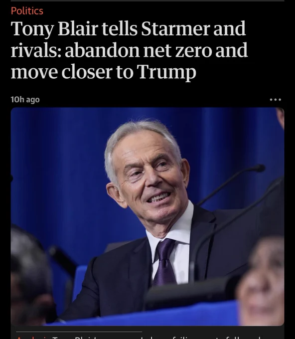 Grinning Tony Blair 